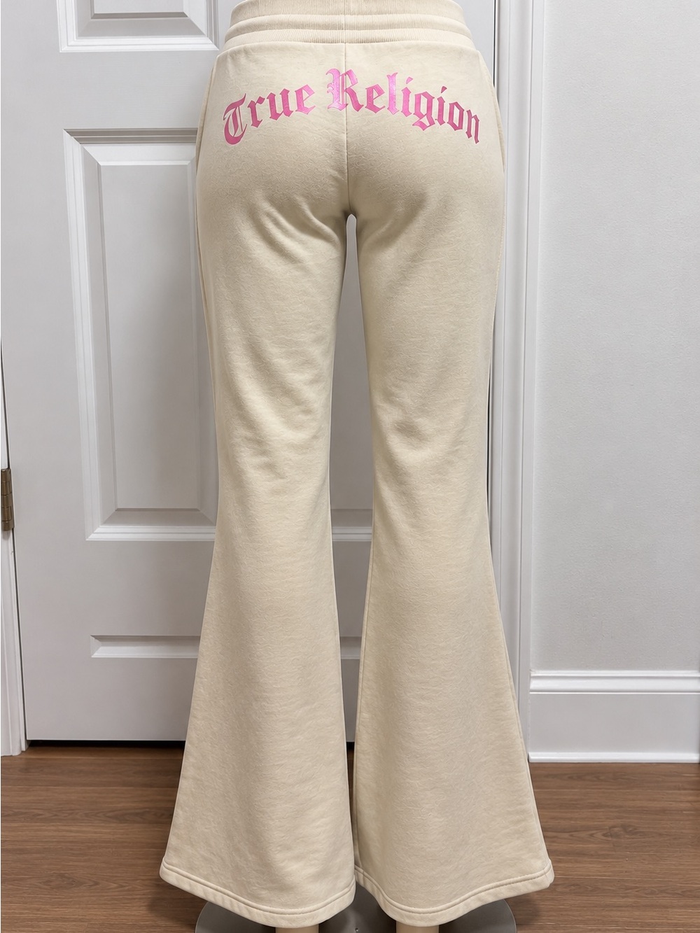 True Religion women’s Cream Flared Sweatpants with Pink Logo